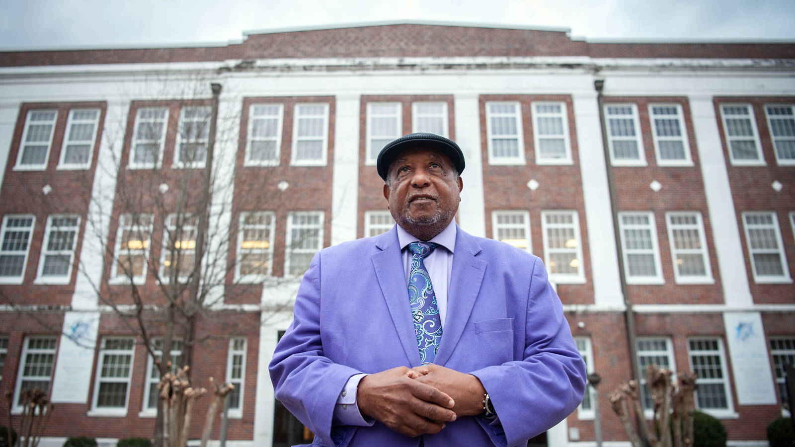 <p>Freedom Rider Bernard Lafayette stands outside Tuskegee University’s main library, where he conducted research before joining the voter registration effort in Selma. Lafayette, a co-founder of the Student Nonviolent Coordinating Committee, was beaten and arrested for attempting to desegregate buses in the South. “When you get as old as I am, you realize that you don't live forever, you know?” he said. “So we want to get as many people as possible participating and making sure that there's a movement for social change.” Tuskegee Institute National Historic Site preserves the history of what is now Tuskegee University, a historically Black college founded by Booker T. Washington.</p>