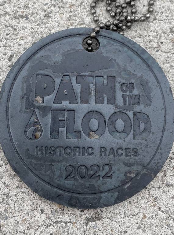 <p>Each runner recieved a medal forged at the local Center for Metal Arts.</p>