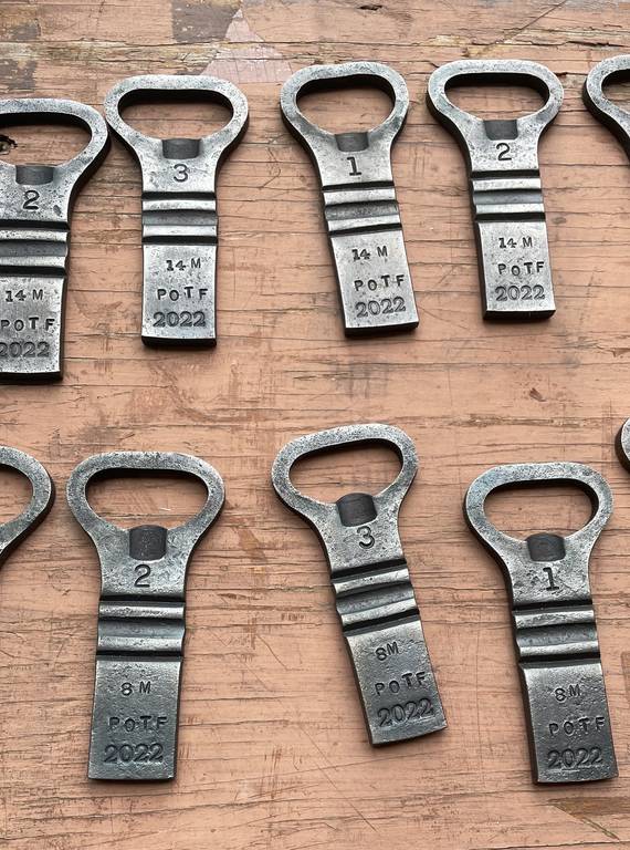 <p>The top three finishers in each distance took home a custom bottle opener.</p>