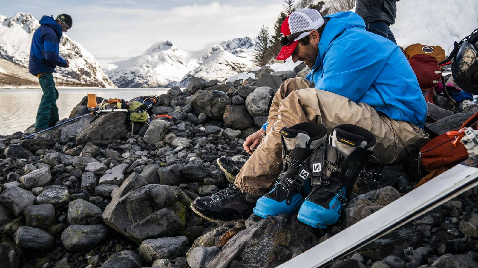 <p>Baldwin Goodell, Jacob Chaney and Erin Griffith gear up for the day along the edge of Harris Bay.</p>