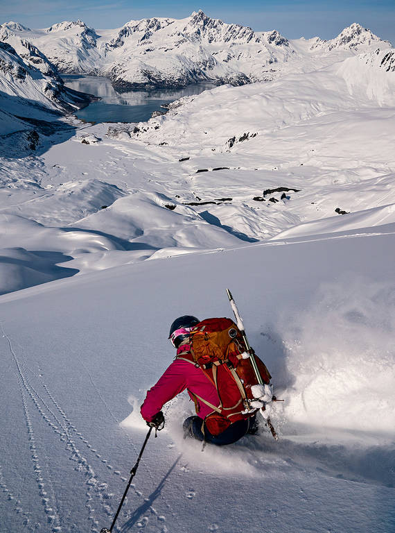 <p>Griffith drops into the fresh powder above Harris Bay.</p>